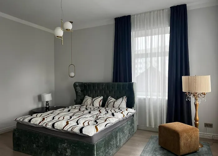 Raina Apartment Gold