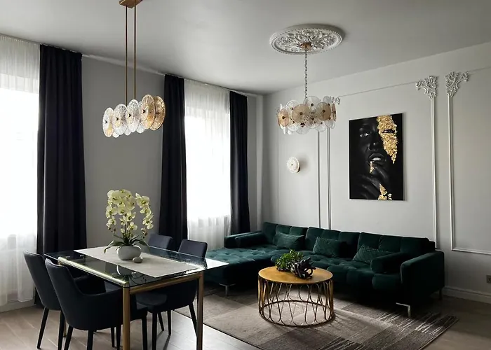 Raina Apartment Gold